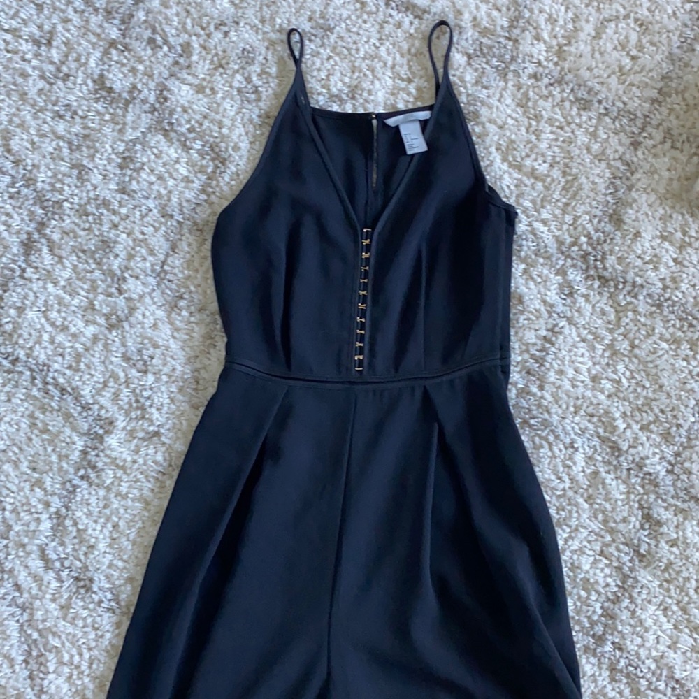 H&M black wide leg jumpsuit with gold accent